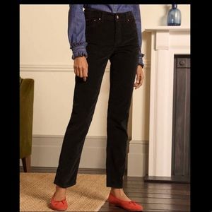 Lane Bryant “Venezia” black corduroy straight leg pants.